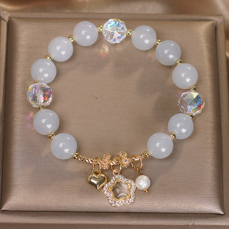 Handmade high-grade gemstone bracelet featuring soft pink love stones